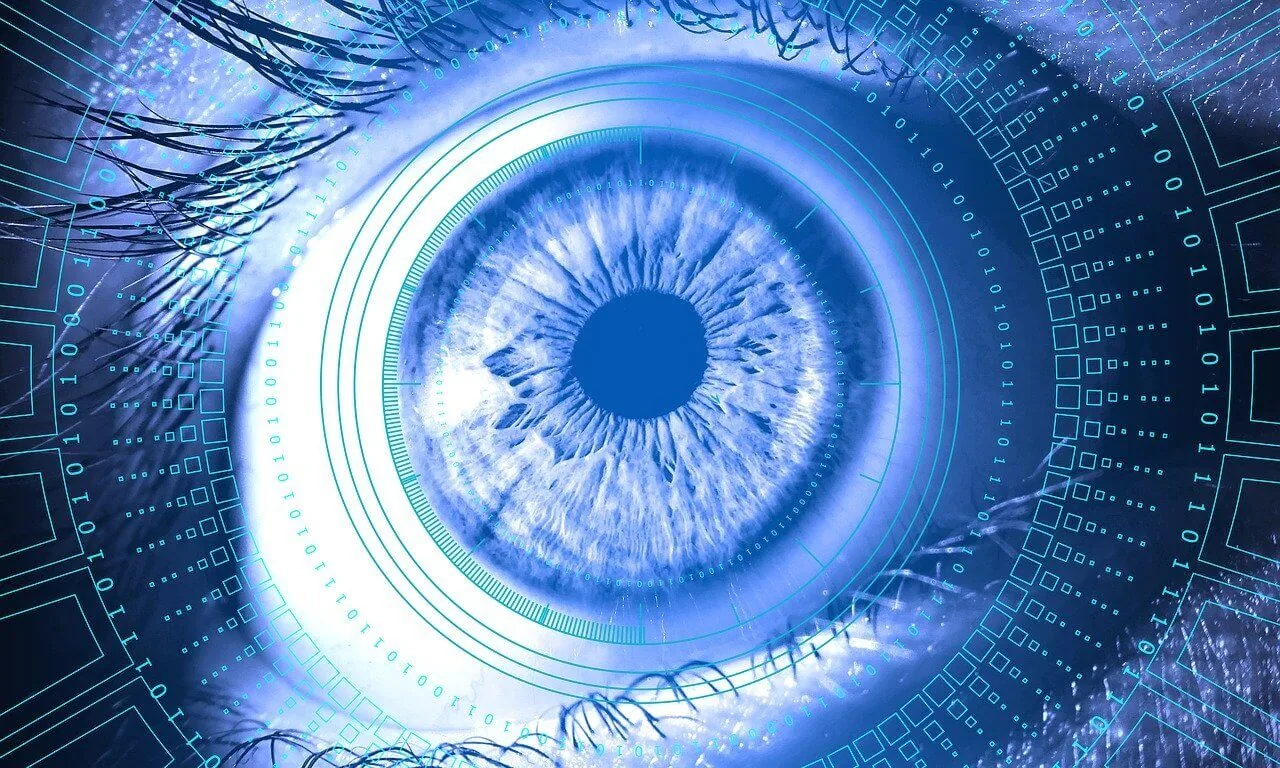 An image of a blue eye with a digital background.