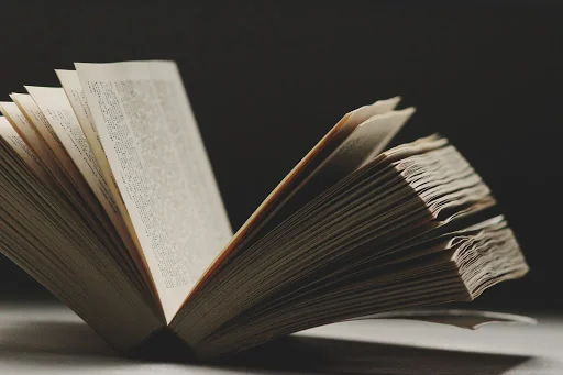 An open book sitting on top of a table.